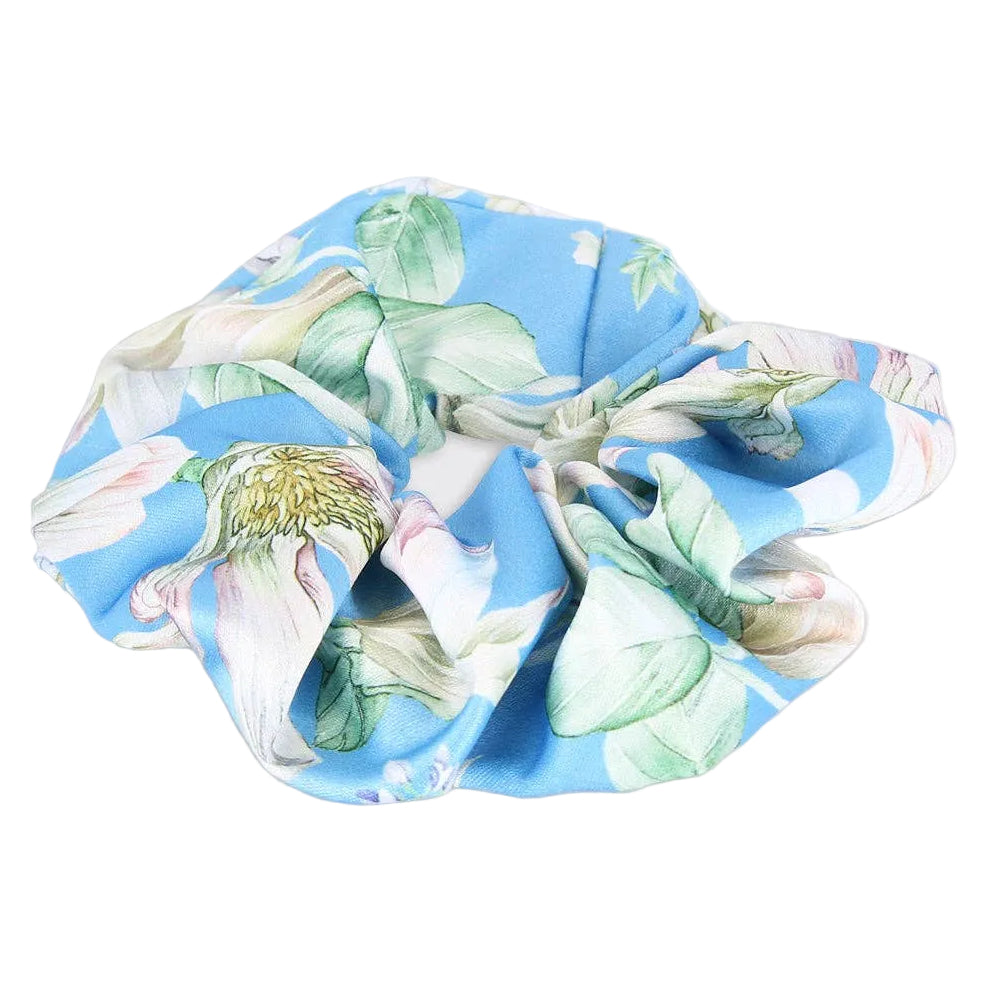 Floral-patterned scrunchie on a light gray background