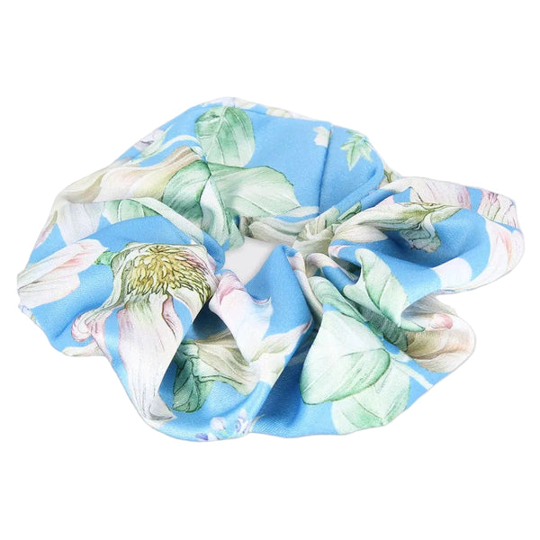 Floral-patterned scrunchie on a light gray background