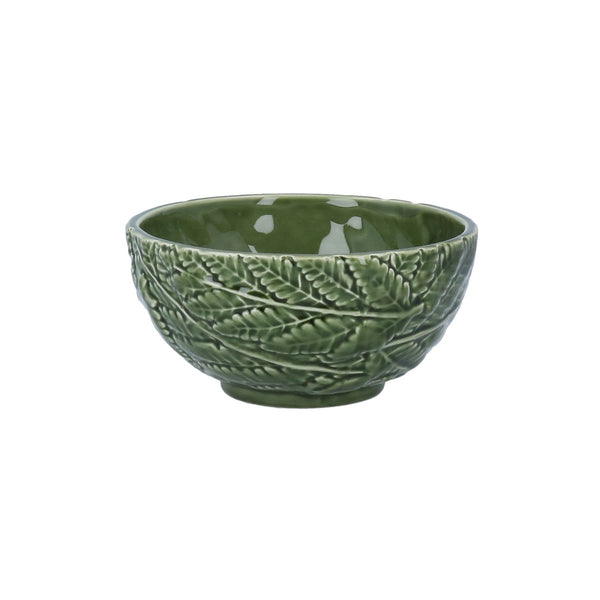 Green ceramic bowl with leaf pattern on a white background