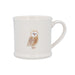 White mug with an owl design on a white background