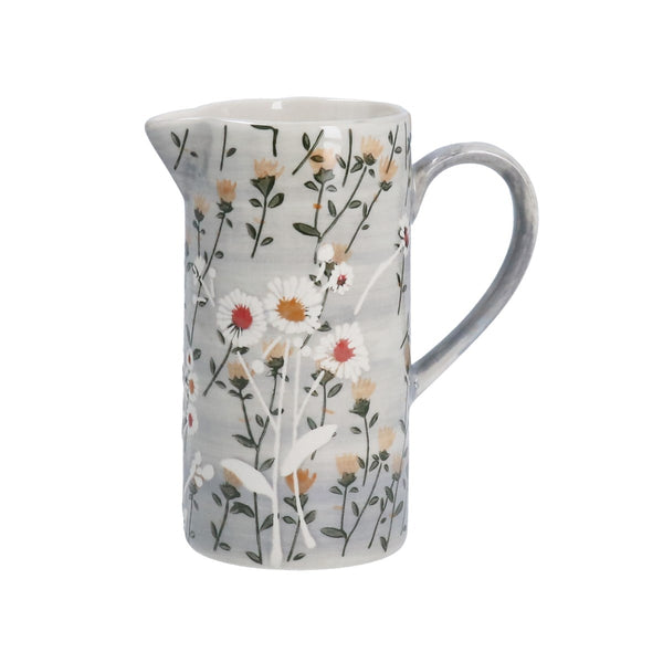 Pitcher with floral pattern on a white background