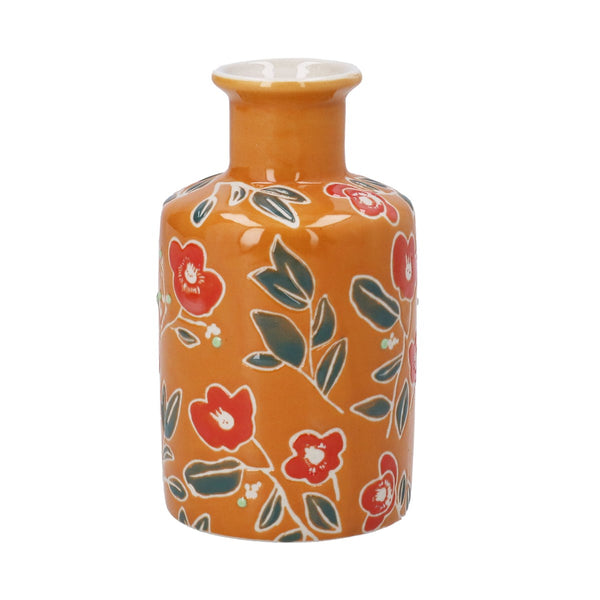 Decorative vase with floral pattern on an orange background