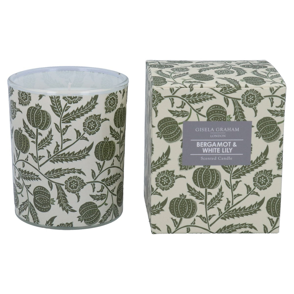 Scented candle with patterned container and matching box on a white background