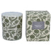Scented candle with patterned container and matching box on a white background