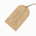 Kraft paper gift tag with 'Merry Christmas' text on a white background