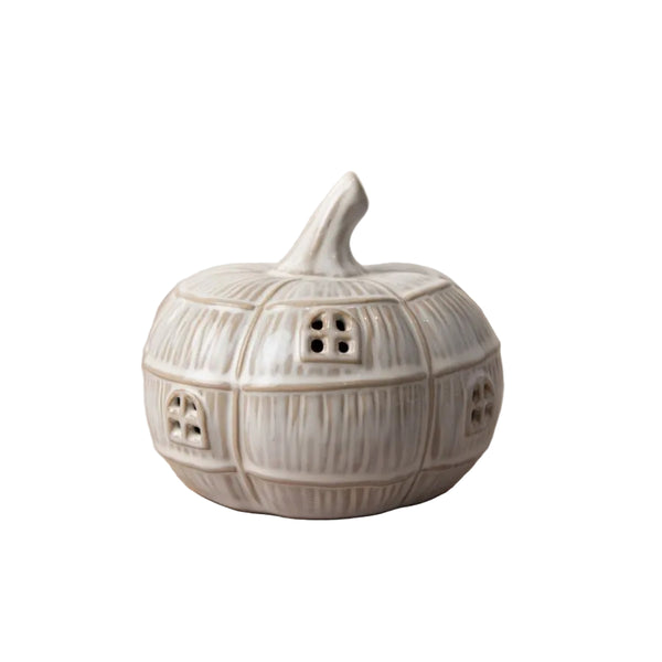 Ceramic pumpkin shaped led nightlight with geometric patterns on a white surface