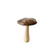 Wooden toy mushroom on a wooden surface with a white background