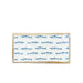 A rectangular wooden serving board with a white top printed with rows of blue fish, set on a light wood tabletop against a white background.