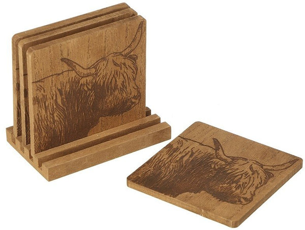 Wooden coasters with engraved bull design on a white background