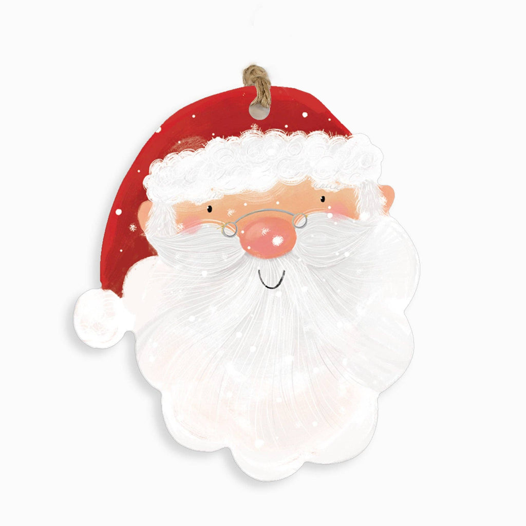 Decorative paper cutout of Santa Claus with a red hat on a white background