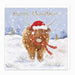 A square Christmas greeting card featuring an illustration of a fluffy brown Highland cow wearing a red Santa hat and red polka-dot scarf in a snowy winter landscape, with 'Merry Christmas' written in gold script at the top.