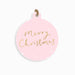 A round light pink Christmas ornament with 'Merry Christmas' written in gold cursive script, decorated with small white dots, and hanging from a natural jute twine loop.