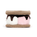Toy resembling a s'more with brown, white, and pink layers on a white background