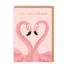 Greeting card with two pink flamingos and 'Happy Anniversary' text on a pink background