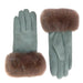 Pair of green gloves with brown fur cuffs on a white background