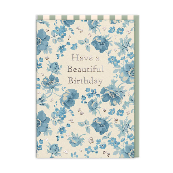 Birthday card with blue floral design and text 'Have a Beautiful Birthday' on a white background