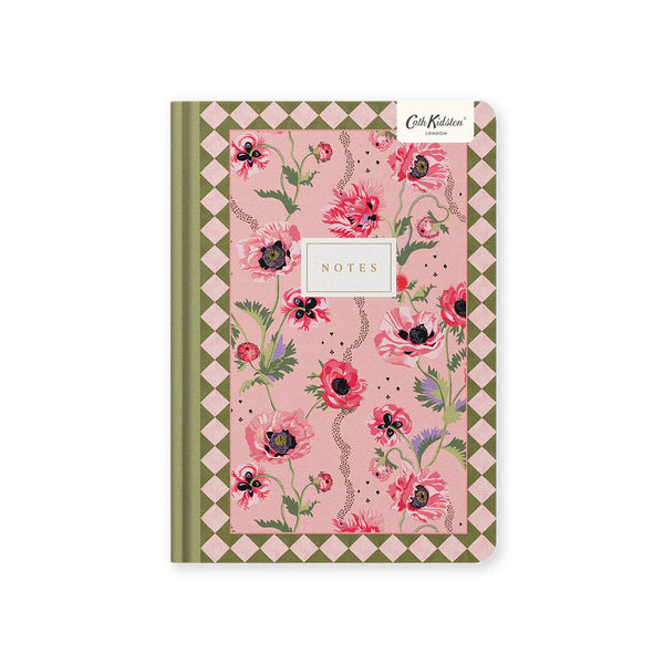 Floral notebook with a pink and green design on a white background