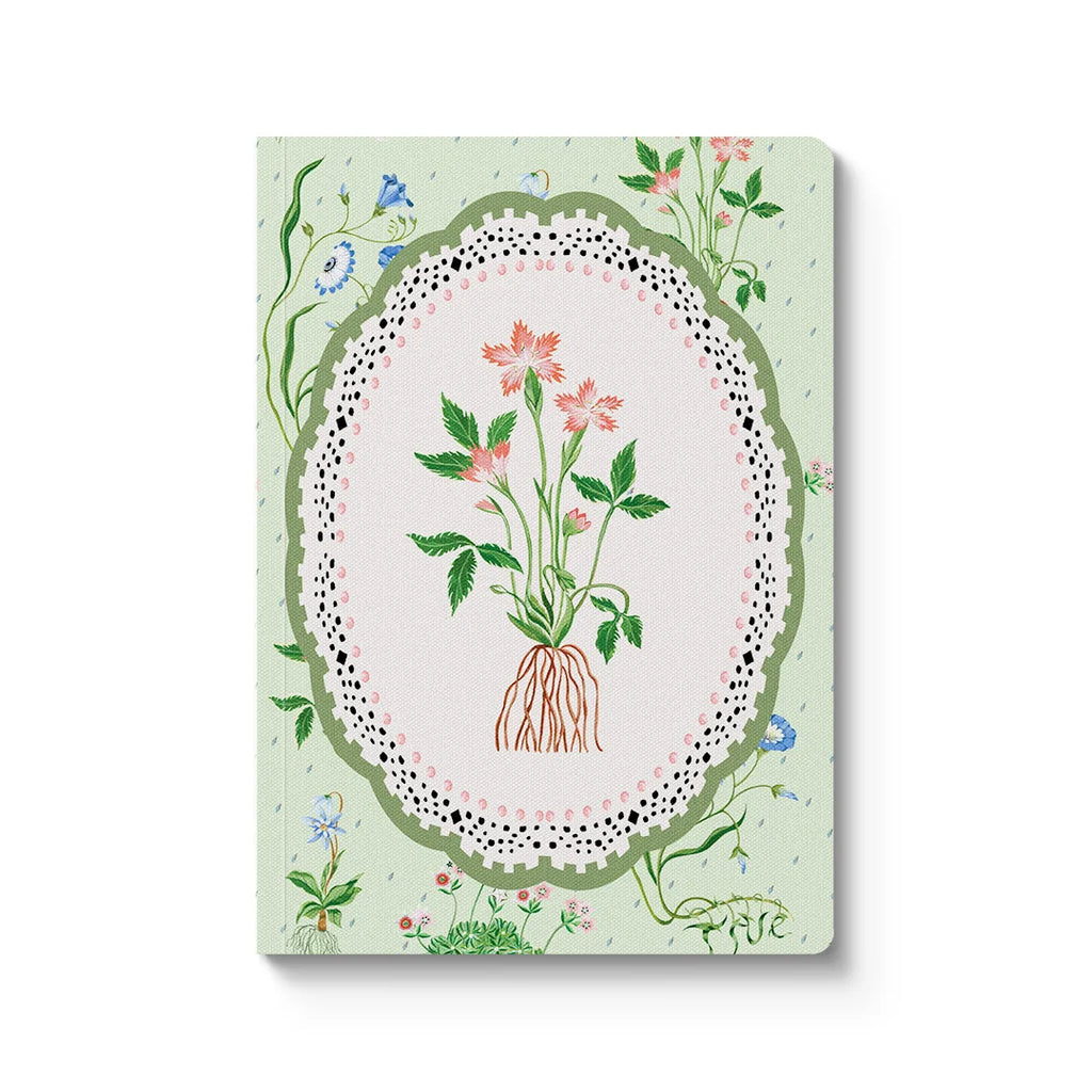 Notebook with floral design on a light green background