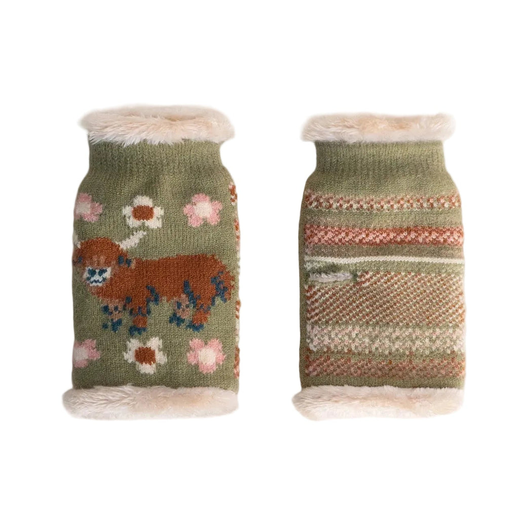 Two knitted dog sweaters with floral and patterned designs on a white background
