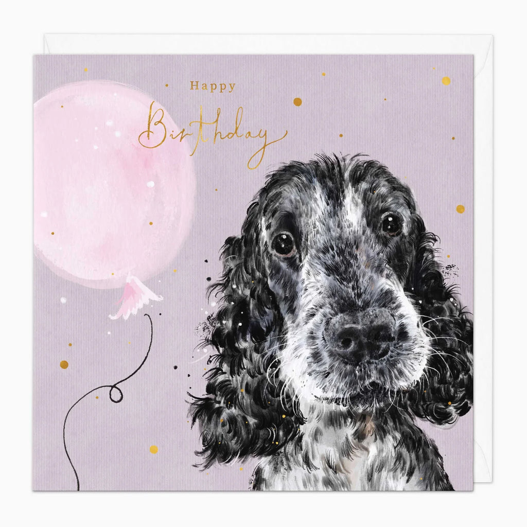 Birthday card with a dog illustration and pink balloon on a light purple background