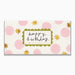 A rectangular greeting card with a white background, pink polka dots, gold starburst accents, and a central scalloped green label reading 'happy birthday to the best sister in law' in black and gold script.