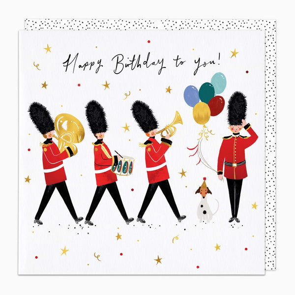 Birthday card with illustrations of soldiers in red uniforms and balloons on a white background.