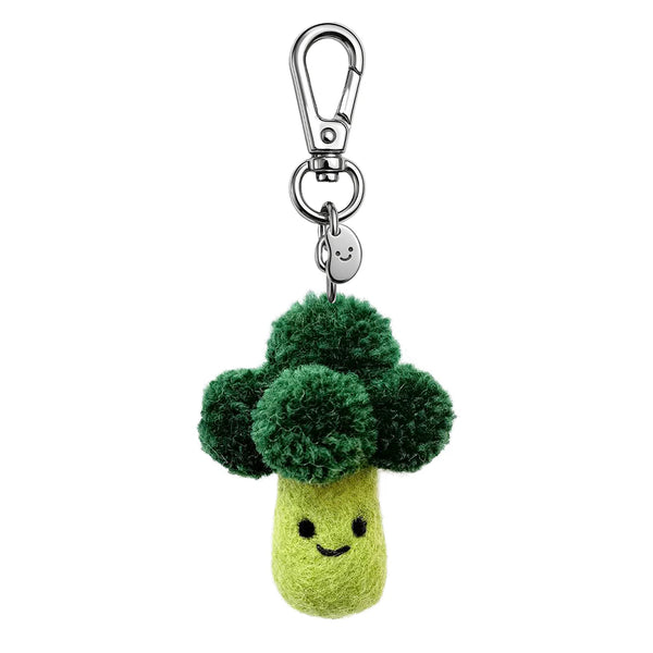 Plush broccoli keychain with a smiling face on a white background