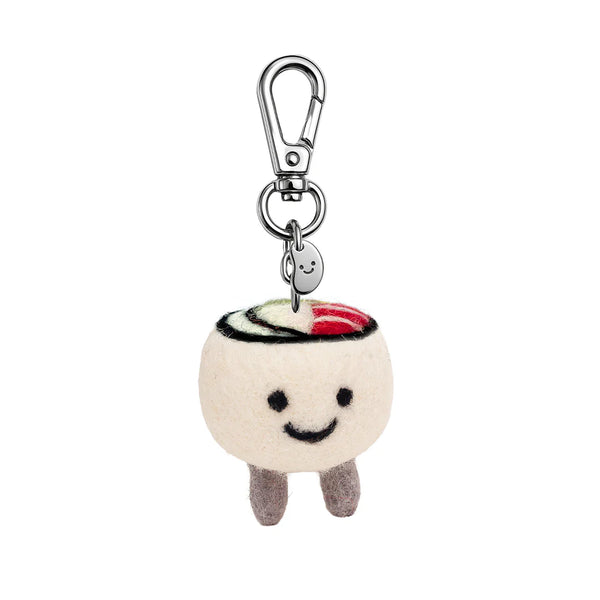 Plush sushi charm with a smiling face on a white background