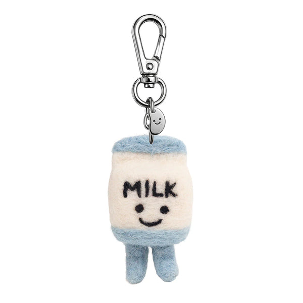 Plush milk carton keychain with a smiling face on a white background