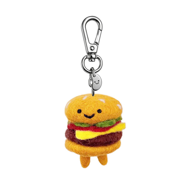 Plush hamburger keychain with a smiling face on a white background