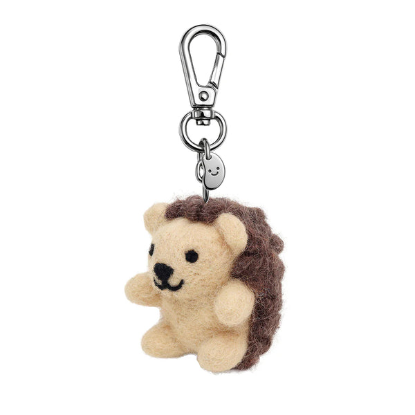 Plush hedgehog keychain with a metal clip on a white background