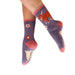 Purple socks with cartoon designs worn by a person on a white background