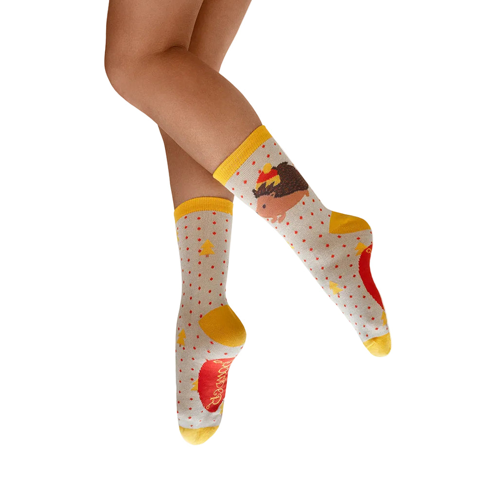 Colorful socks with cartoon character design on a white background