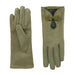 Pair of green gloves with decorative bow on a white background