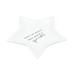 White star-shaped trinket dish with text on a wooden surface