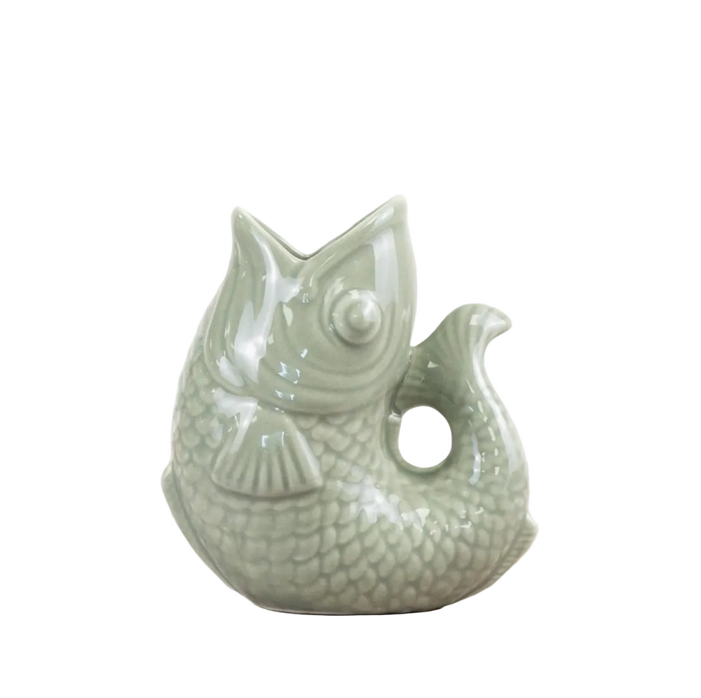 ceramic pitcher or vase shaped like a fish