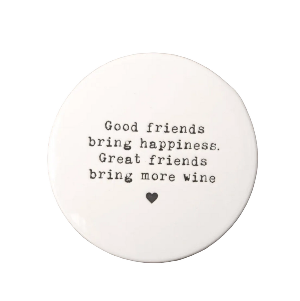 Round white coaster with black text on a white background