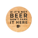 Wooden coaster with engraved text 'If it's not beer, don't park it here' on a white background