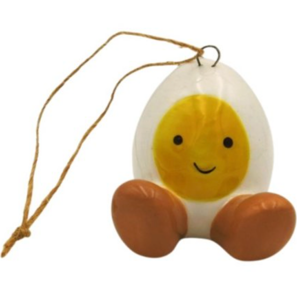 hanging decoration with a white egg character with a yellow yolk face and little brown feet, complete with a rustic jute string for hanging.