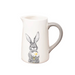 A ceramic serving jug featuring a hand-drawn illustration of a hare (or rabbit) holding a daisy on a white background.