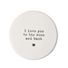 Round white ceramic coaster with 'I love you to the moon and back' text on a white background.
