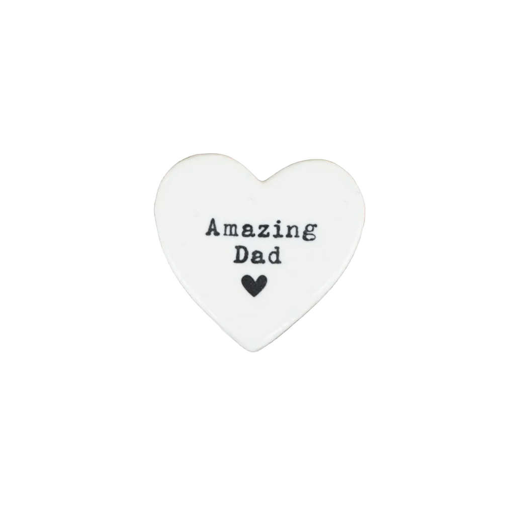 Heart-shaped ceramic tag with 'Amazing Dad' text on a white background
