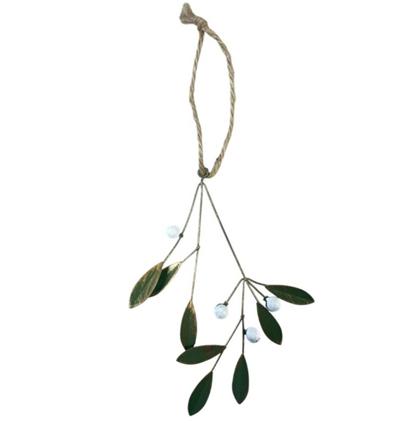 Decorative mistletoe with leaves and berries on a white background