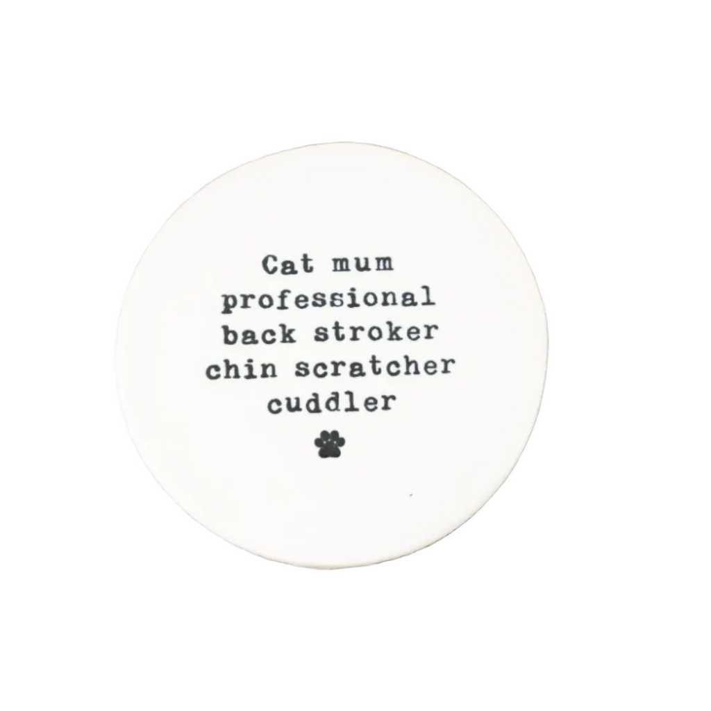 Round white coaster with text on a white background
