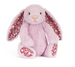Floral-patterned plush rabbit toy on a white background