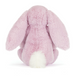 Pink plush bunny toy on a white background