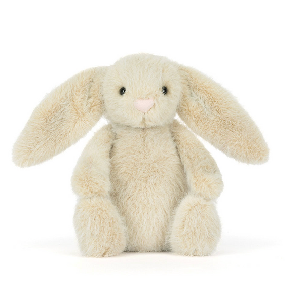 Plush bunny toy on a white background