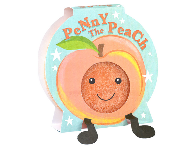 Toy figure of a peach with a smiling face on a white background