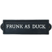 Black sign with 'FRUNK AS DUCK' text on a white surface