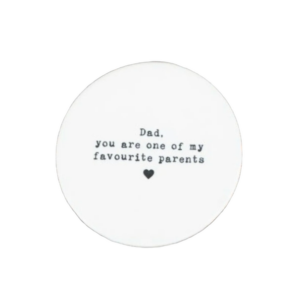 Round white card with text on a white surface